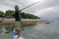 With the fishing boat over the reef